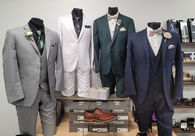Examples of different tuxedo styles and colors available as part of a prom tux rental package at J Robert's Menswear